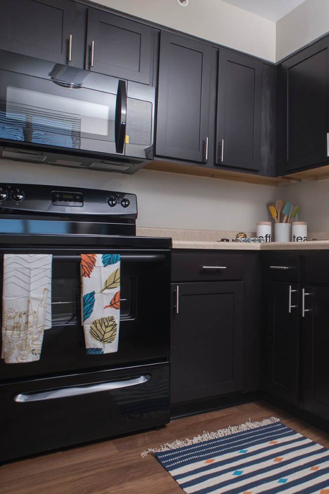 Well-equipped kitchen at Crescent Centre Apartments & Townhomes in Louisville, Kentucky