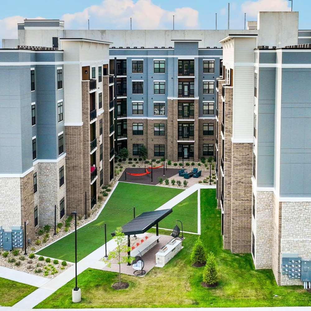 Community view with backyard at Neo Vantage Point in Maryland Heights, Missouri