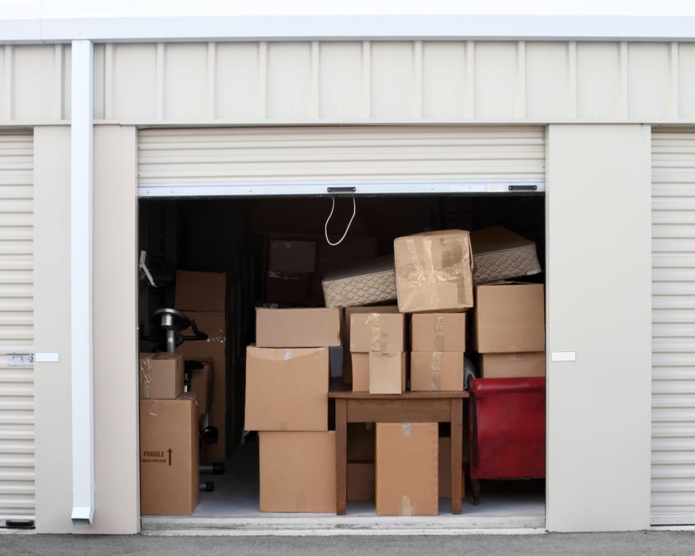 Boxes in an open storage unit at Golden State Storage - Redpoint in Las Vegas, Nevada