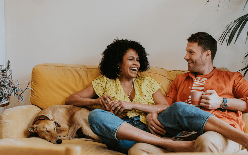 Couple relaxing with their dog at Kenect