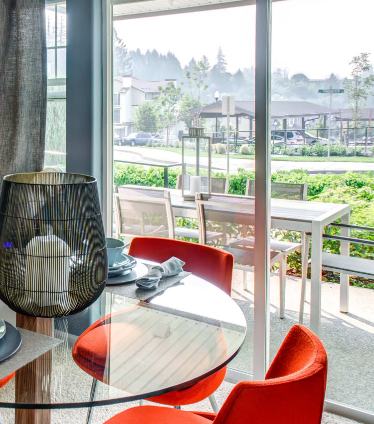 Patio with a view of the neighborhood outside the dining area of a model home at Sofi at Cedar Mill in Portland, Oregon