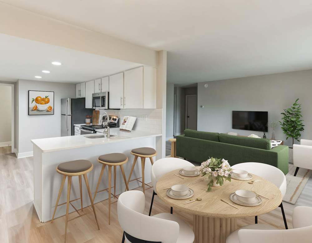 Enjoy Apartments with a Living Room showcasing the Kitchen Area at Eagle Rock Apartments at Malvern in Malvern, Pennsylvania