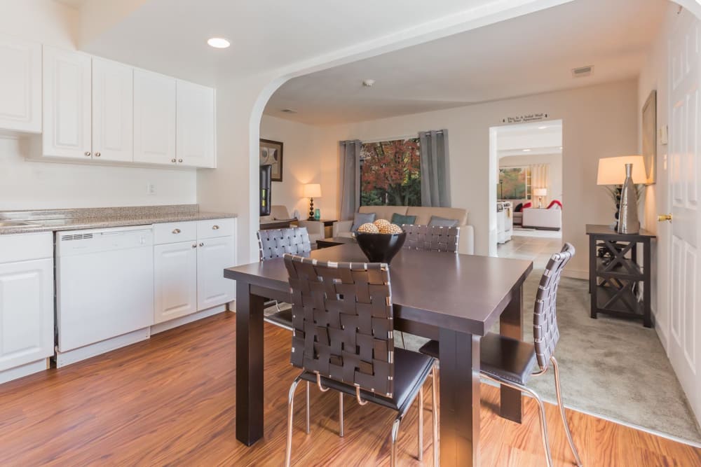 Dining room kitchen combo at Village Square Apartments in Mount Holly, New Jersey