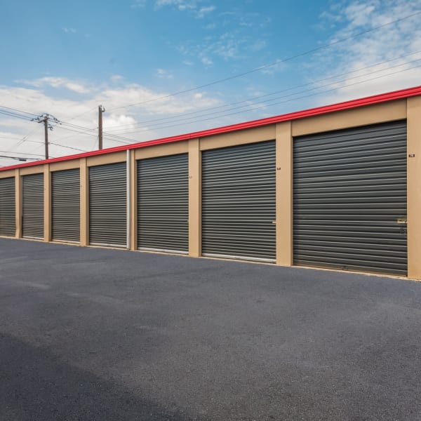 Large outdoor storage units at StorQuest Economy Self Storage in Austin, Texas