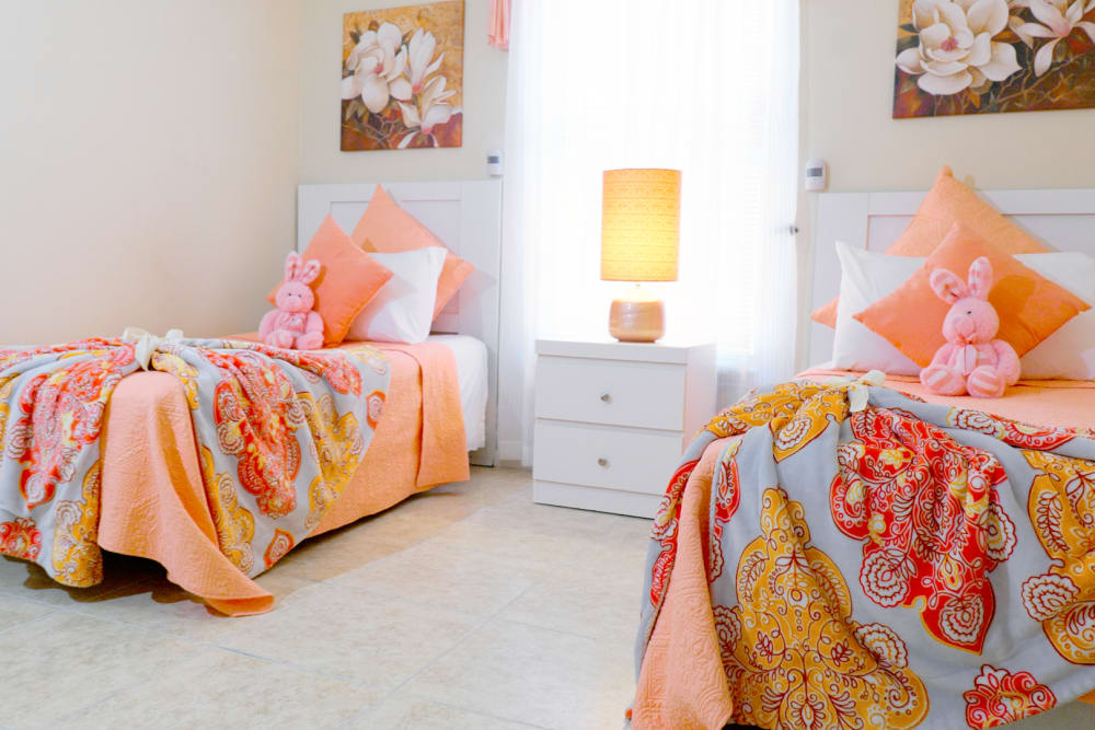 Warming and inviting bedroom at The Club at Wellington in Wellington, Florida