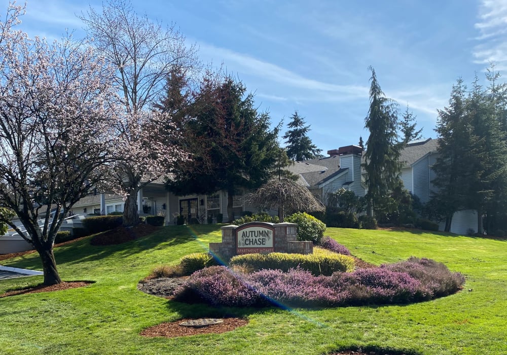 Building exterior and location sign at Autumn Chase in Bothell, Washington