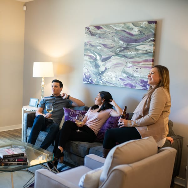 Residents having a party in their spacious living room at BB Living at Val Vista in Gilbert, Arizona