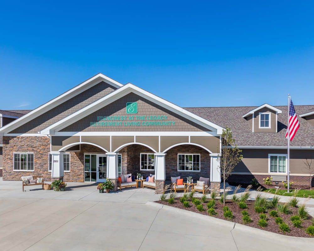 Main entrance and parking lot to Edencrest at The Legacy in Norwalk, Iowa.