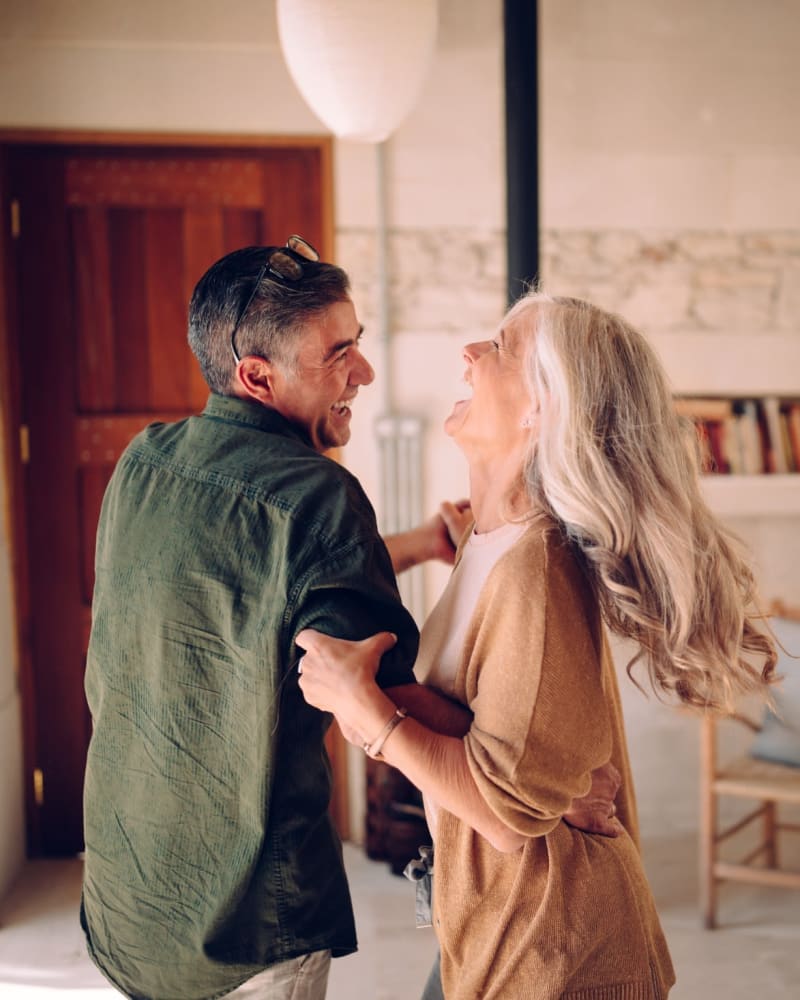 Resident couple dancing outside at Briar Glen in Oklahoma City, Oklahoma