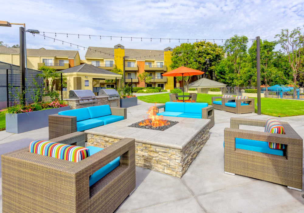 Well-designed outdoor lounge with a fire pit at Sofi Irvine in Irvine, California