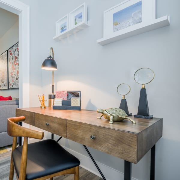 Model office desk in spacious living room at The Veranda at Market Common in Myrtle Beach, South Carolina