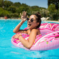 Resident enjoying the pool at Acadia in San Antonio, Texas