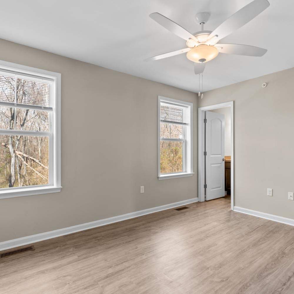 Bedroom with ceiling fan at Brock Bridge Landing in Jessup, Maryland