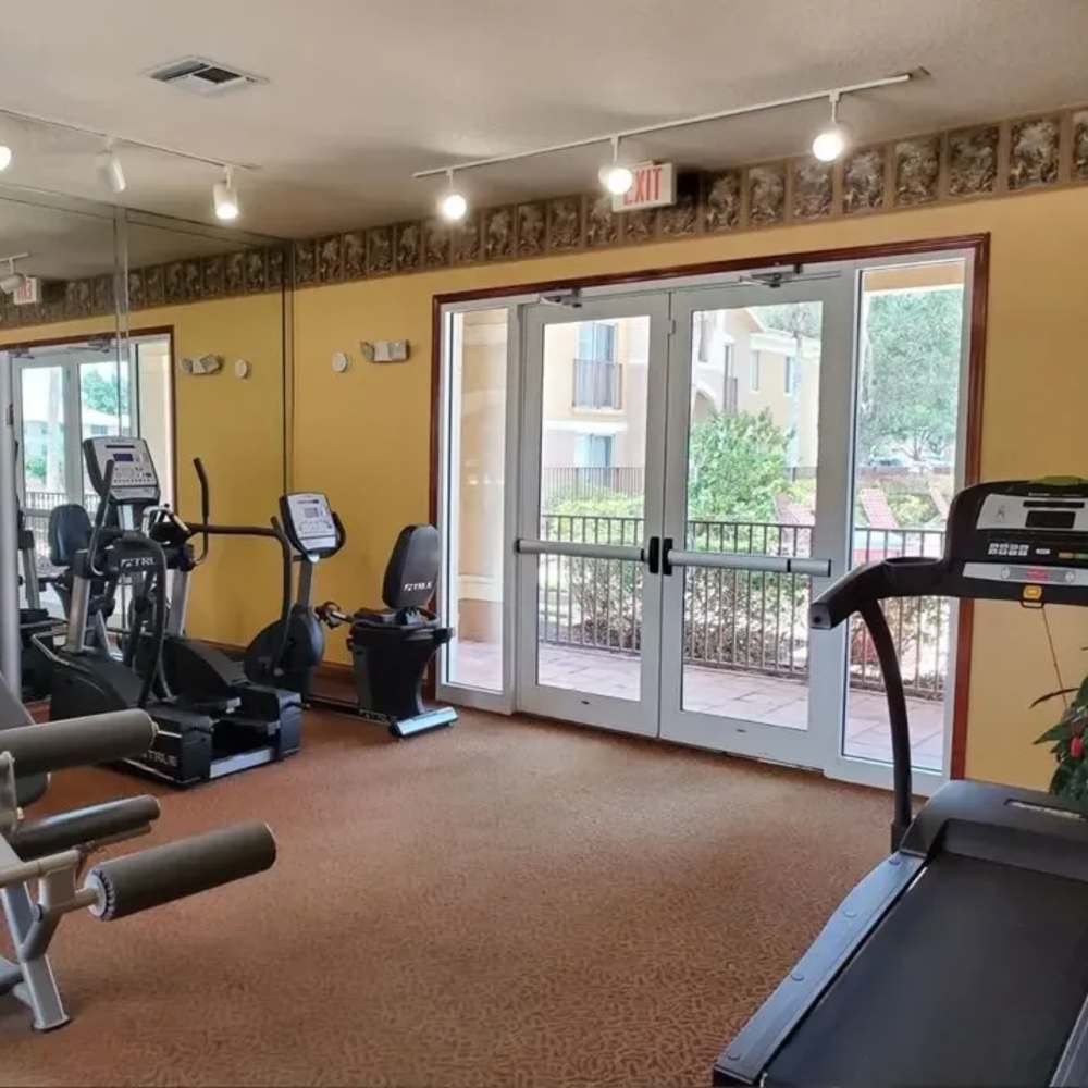 Interior community gym at Bernwood Trace in Fort Myers, Florida