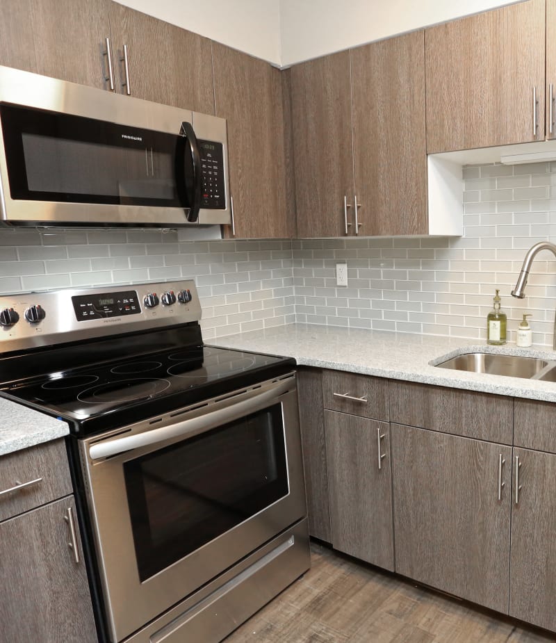 Sleek kitchen at The August Apartments in Lexington, Kentucky