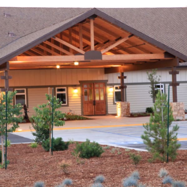 driveway and main entrance to Quail Park Memory Care Residences of Visalia in Visalia, California
