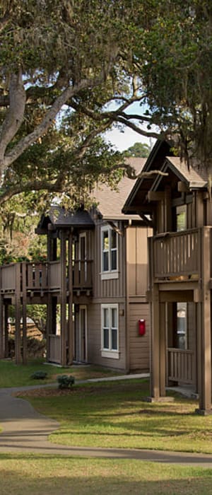 Large grassy lawn for playing fetch with your furbaby at Seventeen Mile Drive Village Apartment Homes in Pacific Grove, California