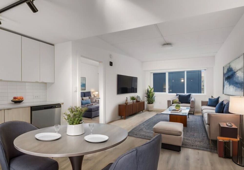 Model open layout living room, dining and kitchen  at Mily on Green in Philadelphia, Pennsylvania