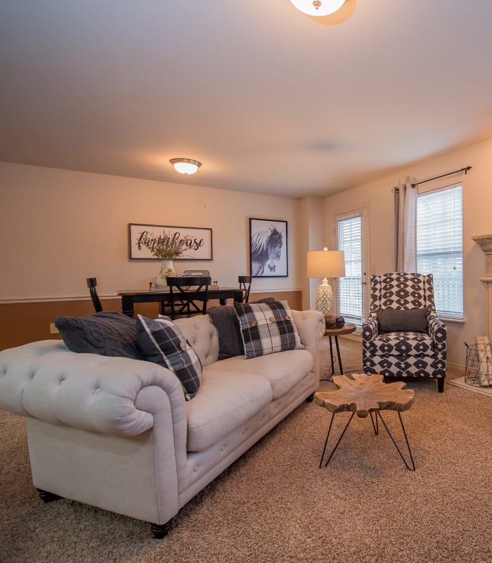 Spacious living room with large windows at The Park on Westpointe in Yukon, Oklahoma