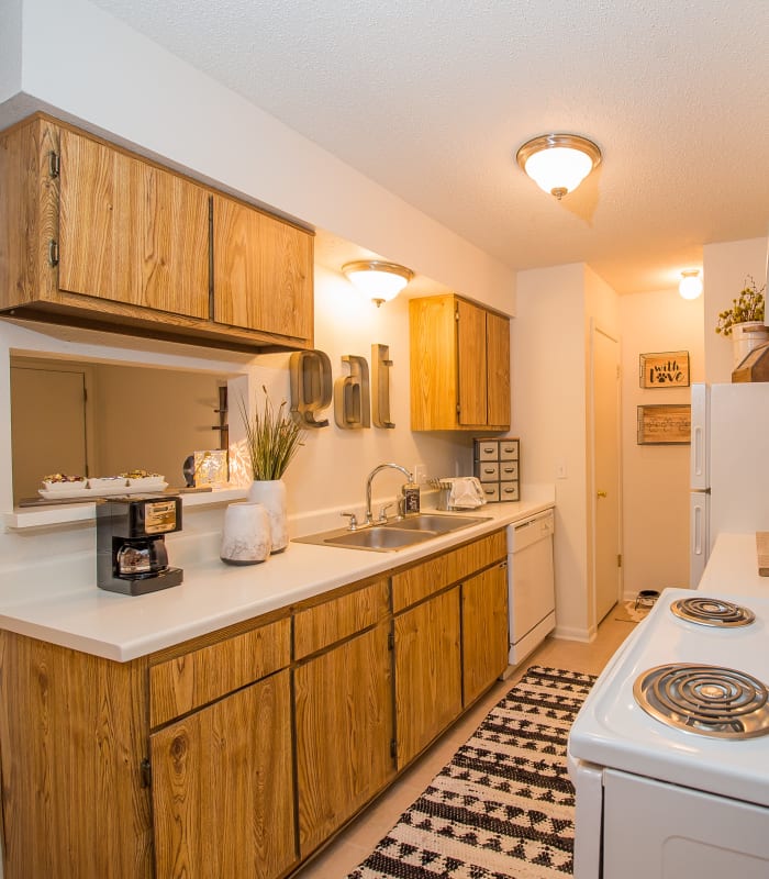 Kitchen with granite countertops at Waters Edge in Oklahoma City, Oklahoma