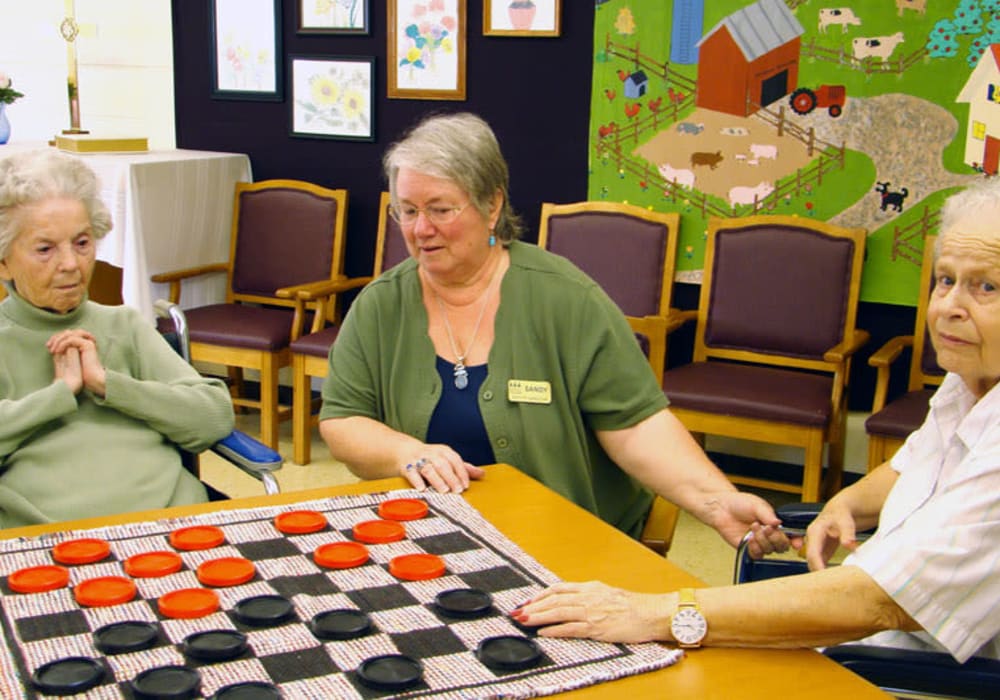 Residents playing a game of checkers at Montello Care Center in Montello, Wisconsin