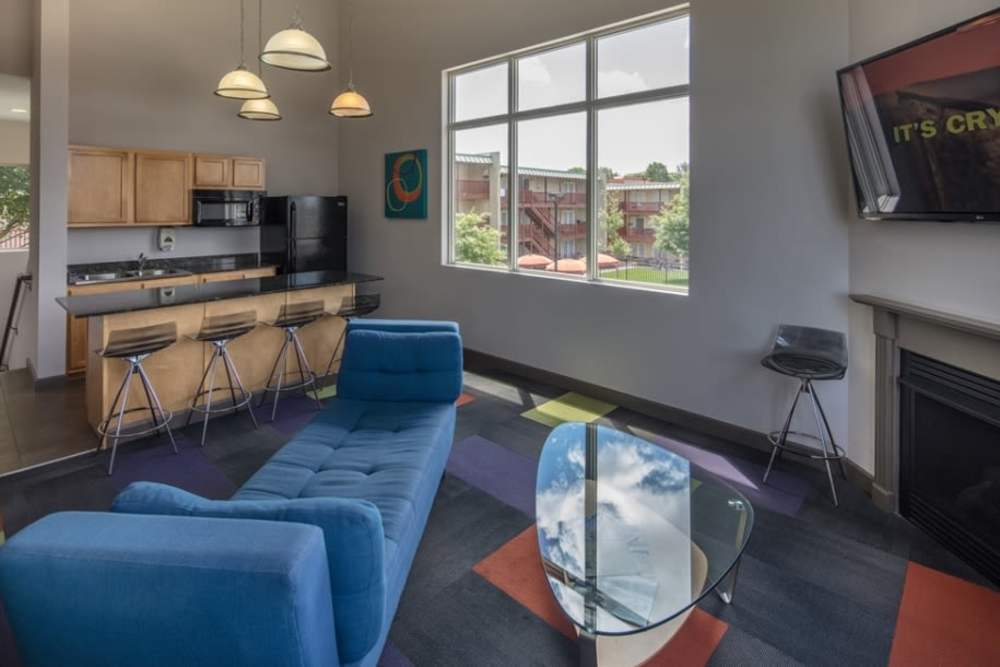 Clubhouse with lounge seating and community kitchen at Tiger Village in Columbia, Missouri