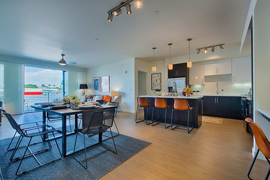 Open kitchen and dining space a The TOMSCOT in Scottsdale, Arizona