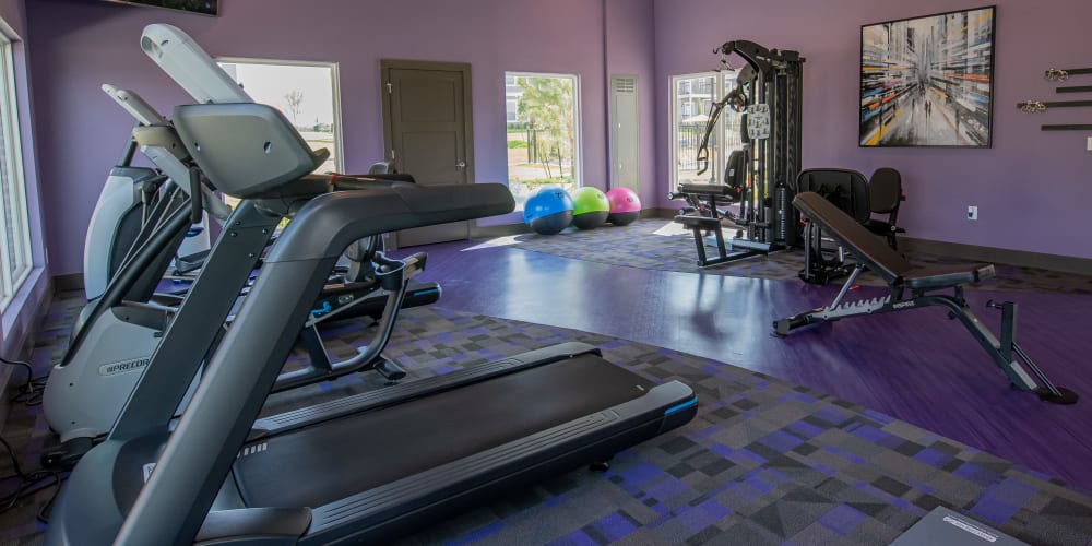 Well equipped fitness center at Cottages at Crestview in Wichita, Kansas