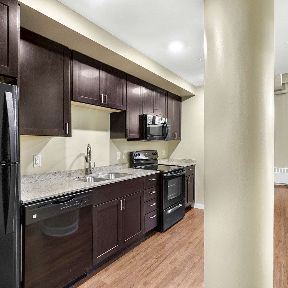 Kitchen with wooden flooring at 430 Oak Grove in Minneapolis, Minnesota