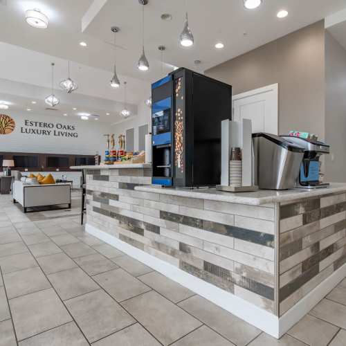 Resident getting some directions from the concierge at Evergreen Estero in Fort Myers, Florida