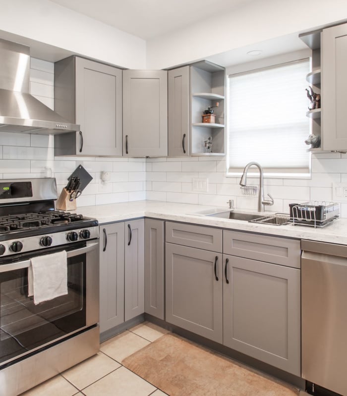 Model kitchen with gray accents at Chisholm Pointe in Oklahoma City, Oklahoma