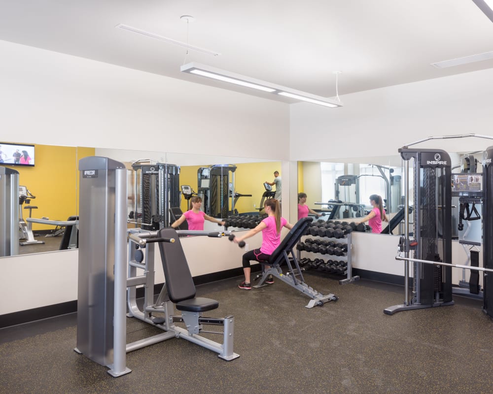 Residents staying in shape in the fitness center at Marvel 29 in Portland, Oregon