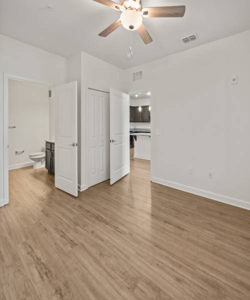 Spacious bedroom with attached bathroom at Fletcher Black in Panama City, Florida