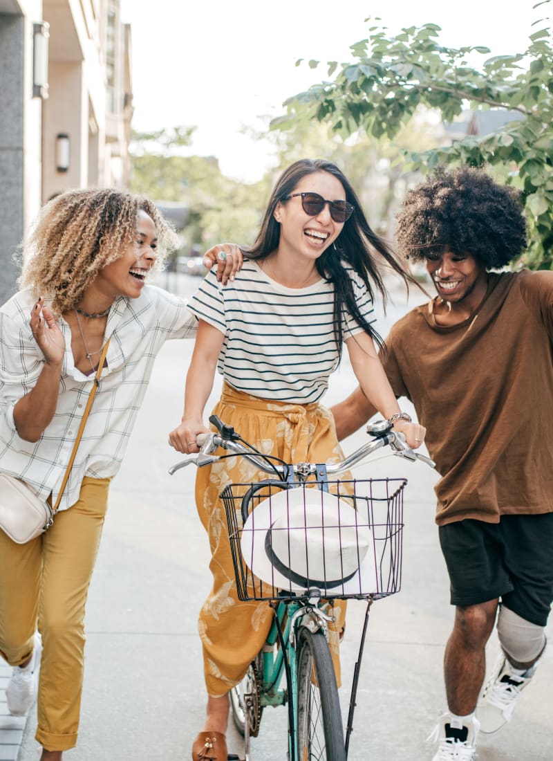 Resident on her bike with friends in Charlotte, North Carolina near Marquis of Carmel Valley