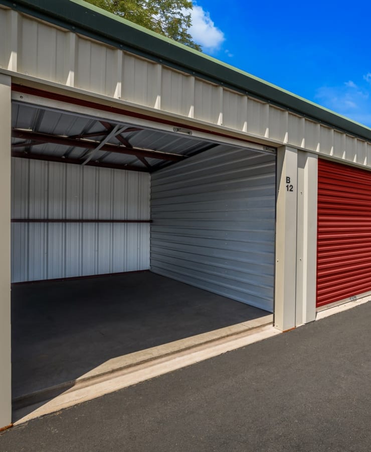 Open outdoor storage units with drive-up access at StorQuest Self Storage in Tucson, Arizona