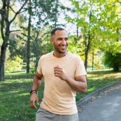 Man running in the park near Fletcher Black in Panama City, Florida