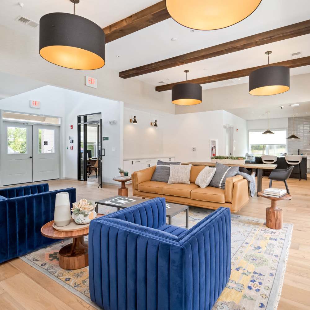 Apartment clubhouse seating area interior at The Warrick in Nashville, Tennessee