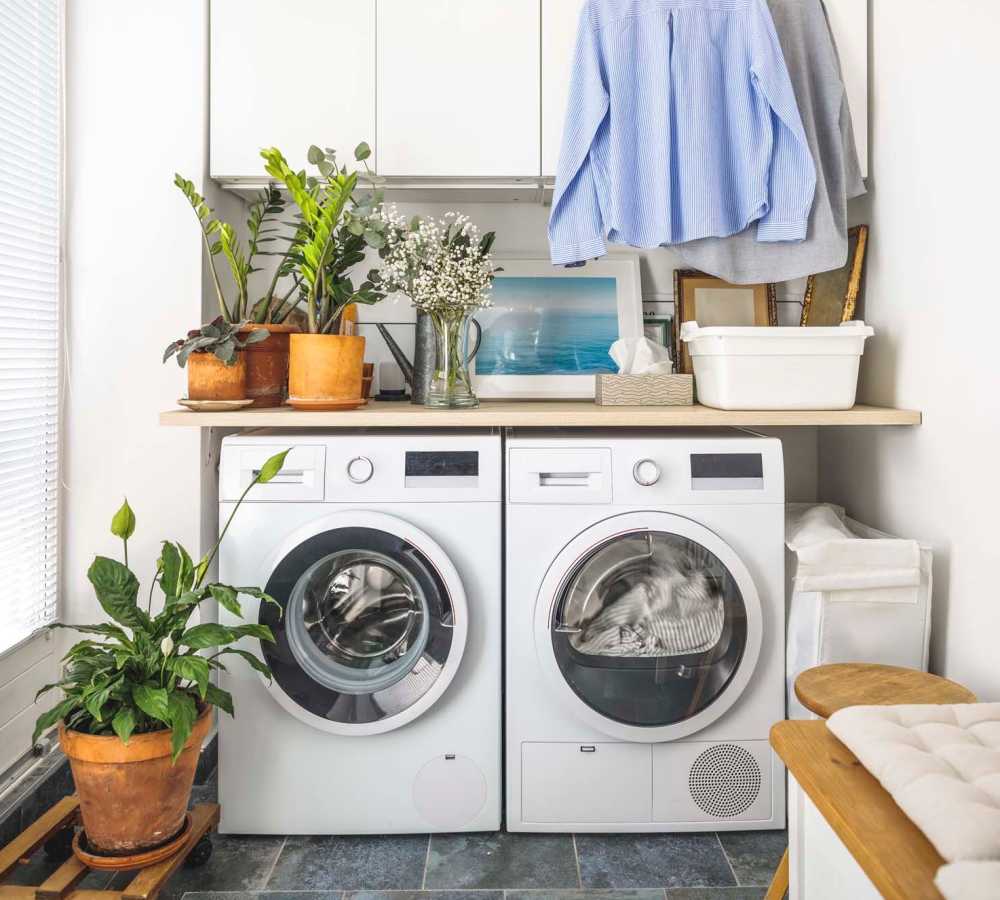 Clothes spinning in washing machine at Avia Lofts at Maple Road in Amherst, New York