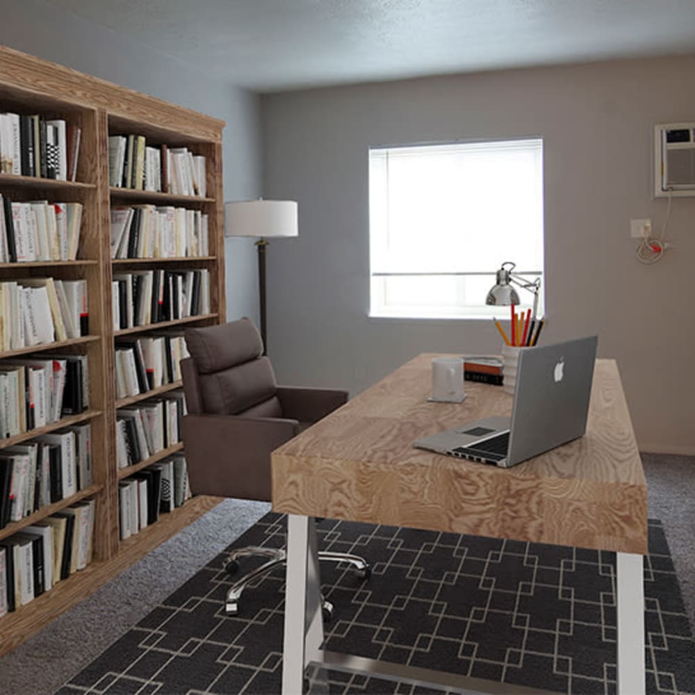 Home office with a desk and bookshelf at Park Place of South Park in South Park, Pennsylvania