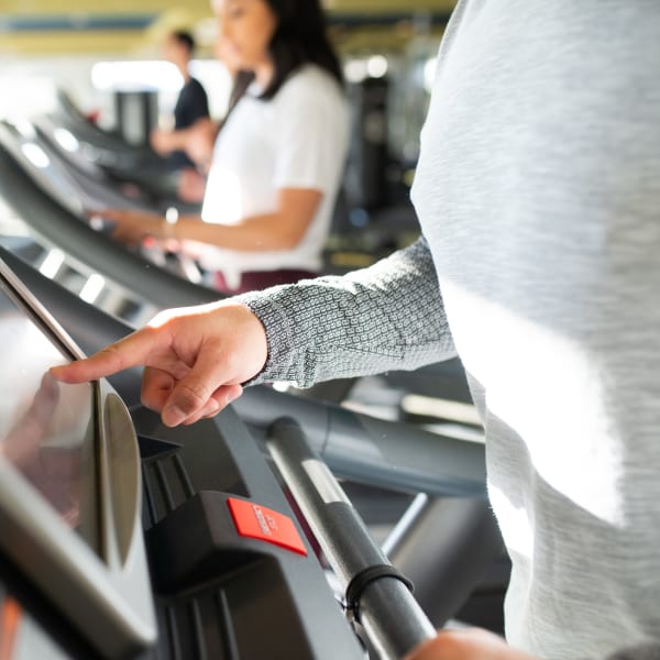 Residents doing cardio in the fitness center at The Regents at Scottsdale in Scottsdale, Arizona
