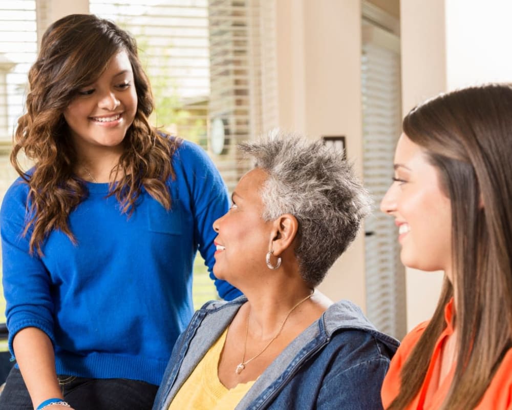 Family comes to visit resident at Milestone Senior Living Stoughton in Stoughton, Wisconsin.
