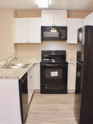 Kitchen with black appliances at Lakeview in Reno, Nevada