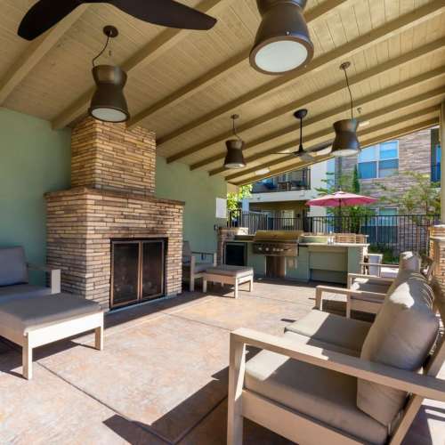 Outdoor lounge with barbecues at BDX at Capital Village in Rancho Cordova, California