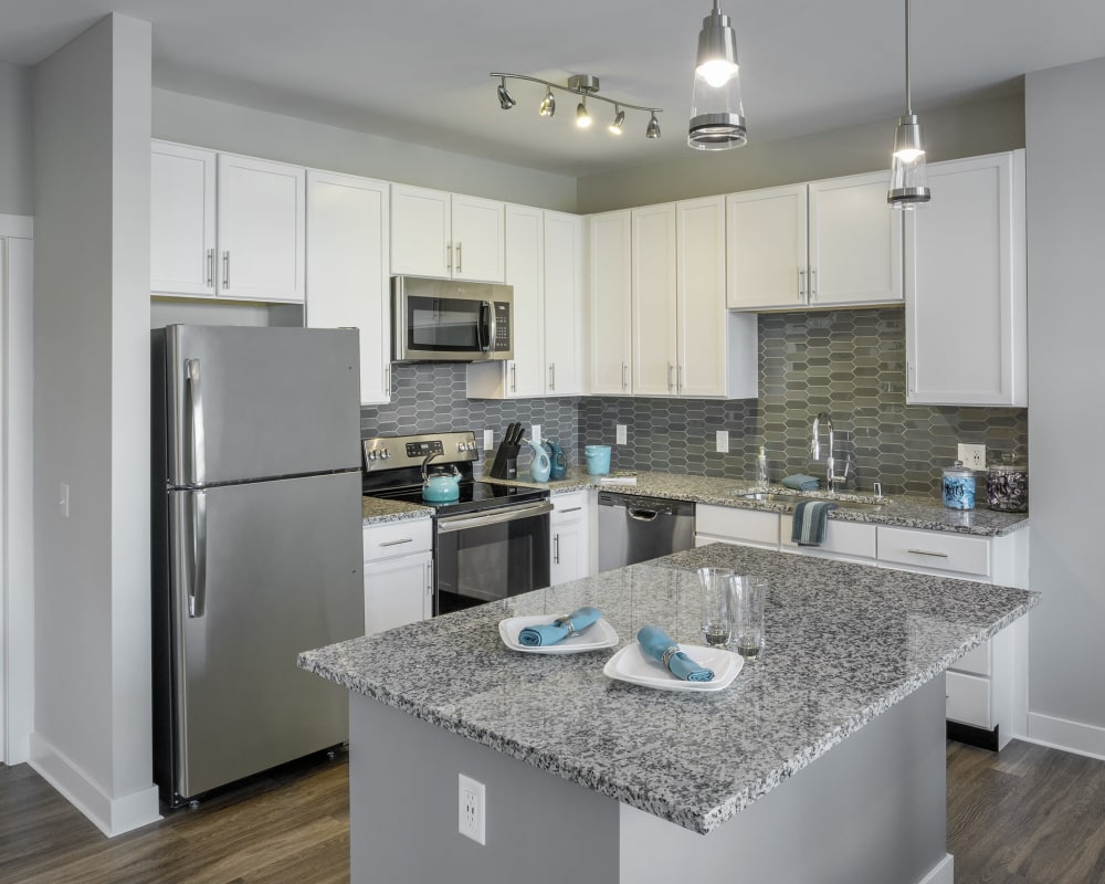 Beautiful kitchen with granite countertops at The Residences at Crosstree in Freeport, Maine