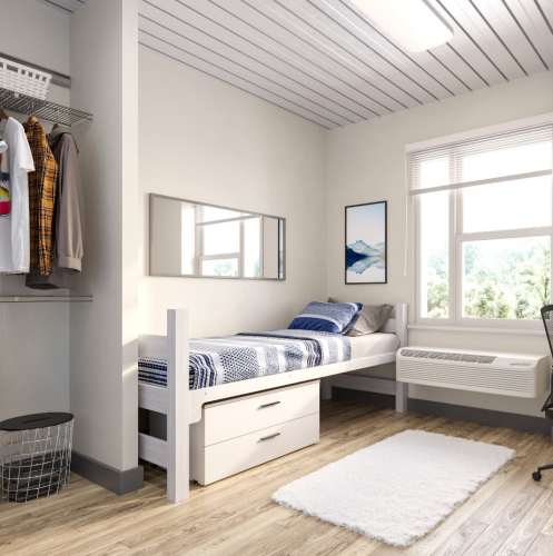 Bedroom with bed and attached closet at Polly O'Meara Doyle Hall in Santa Rosa, California