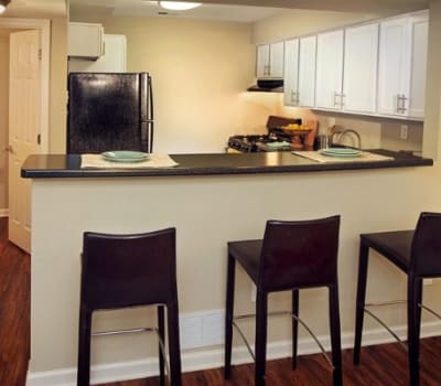 Dining area and kitchen at Nineteen North Apartments in Pittsburgh, Pennsylvania
