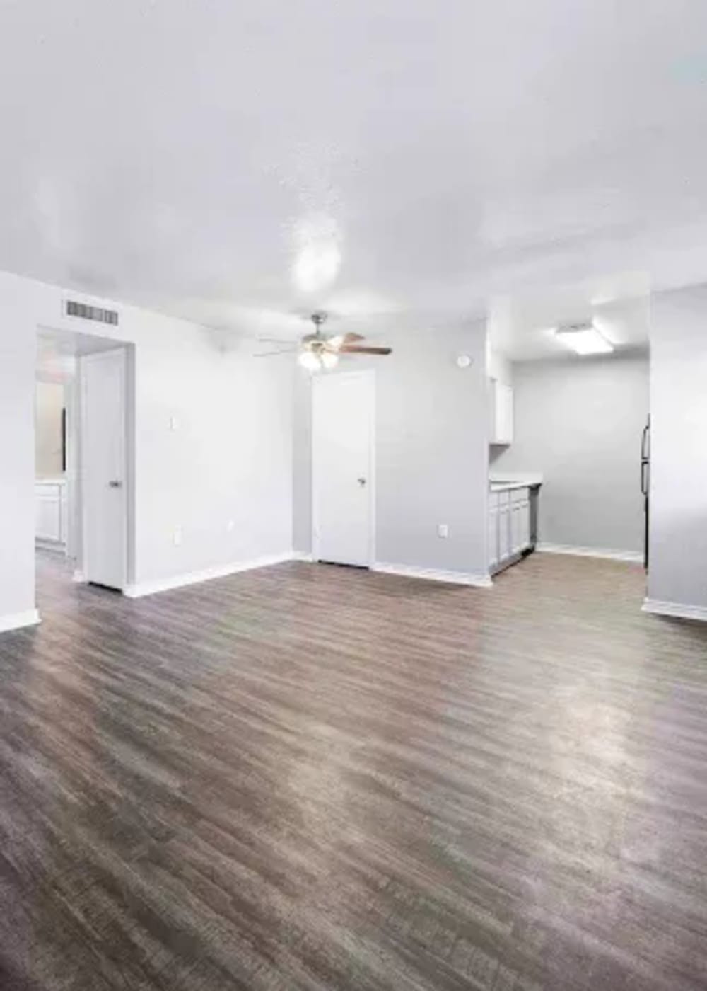 Spacious living room at Tradewind Apartments in Mesquite, Texas