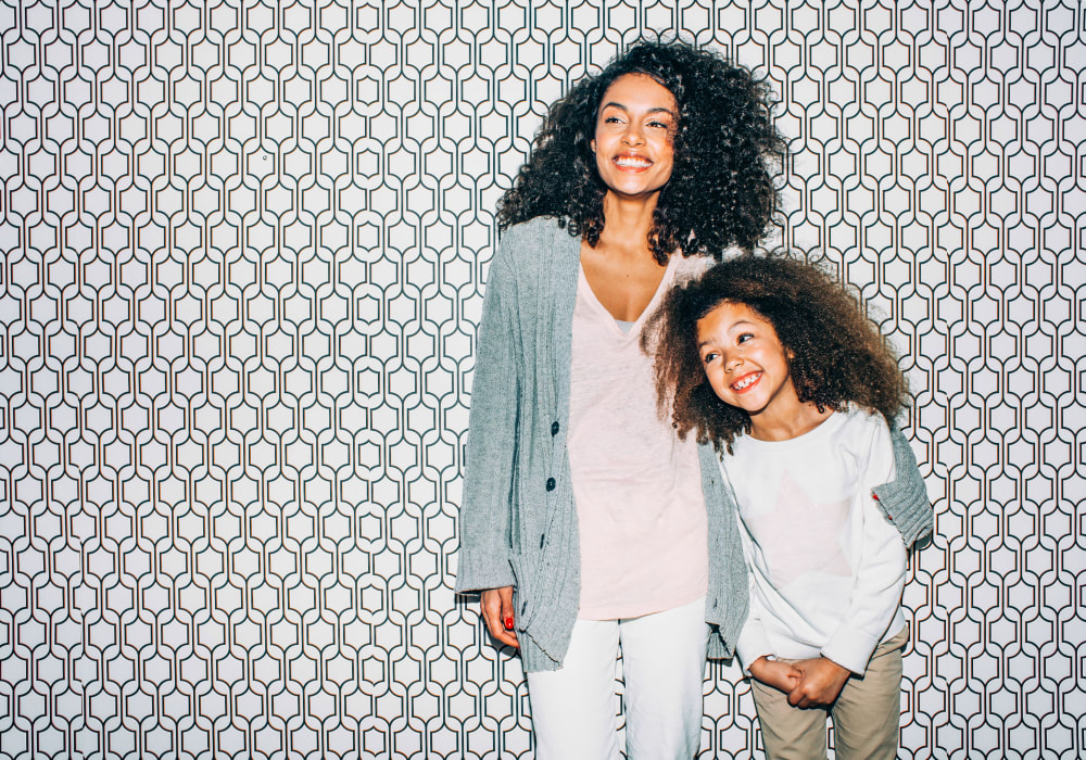 Resident mother and daughter posing for a photo at Sofi Dublin in Dublin, California