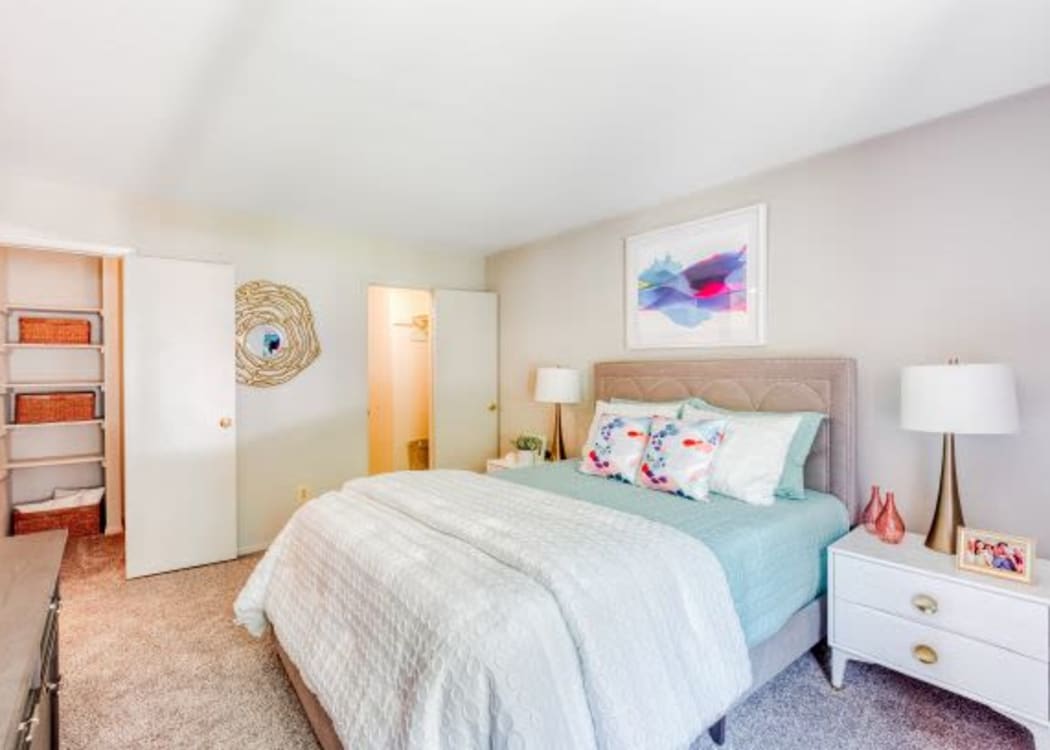 Large bedroom in a model home at The Timbers at Long Reach Apartments in Columbia, Maryland