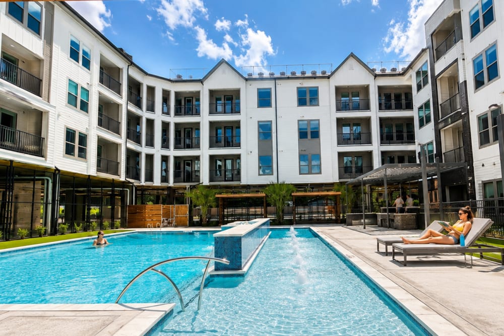 Residents enjoy the swimming pool and tanning deck. 